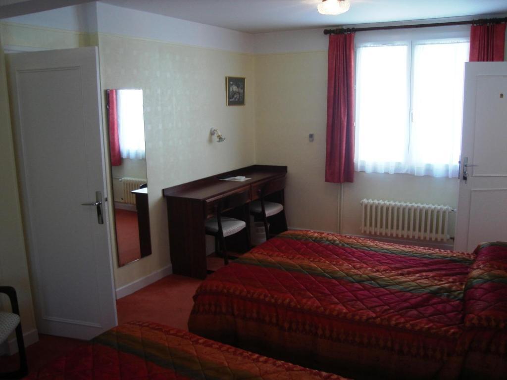 Hôtel Beauséjour Chaudes-Aigues Quarto foto